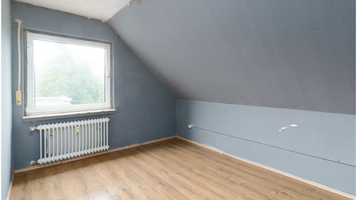 ***Einfamilienhaus mit Einliegerwohnung in zentraler Lage von Ostrhauderfehn***
