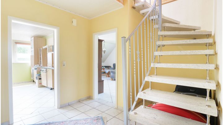 Einfamilienhaus mit großzügiger Einliegerwohnung

***zentral in Ostrhauderfehn auf ca. 7.500 m² Grundstück***