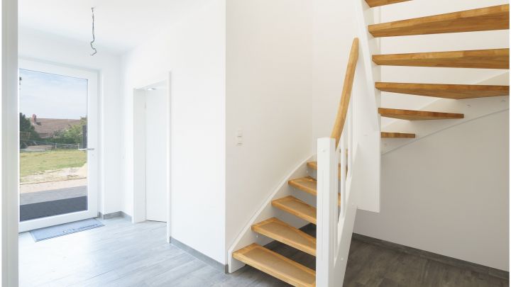 ***Exklusive Neubau-Wohnung - 4 ZKB - Reihenmittelhaus in Flachsmeer***

Carport, Garten, Einbauküche