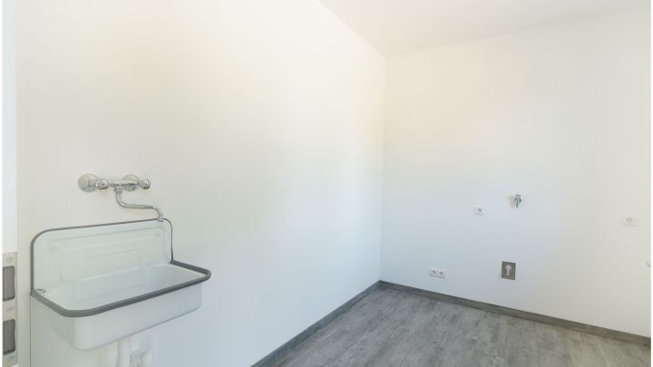 ***Exklusive Neubau-Wohnung - 4 ZKB - Reihenmittelhaus in Flachsmeer***

Carport, Garten, Einbauküche